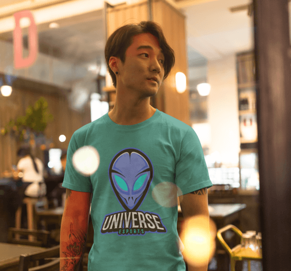 Asian Fashion Man Wearing A T Shirt Mockup With Gaming Logo Design